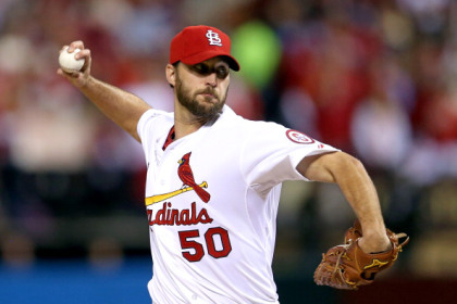 ST LOUIS, MO - OCTOBER 28:  Adam Wainwright #50 of the St. Louis Cardinals pitches in the first inning against the Boston Red Sox during Game Five of the 2013 World Series at Busch Stadium on October 28, 2013 in St Louis, Missouri.  