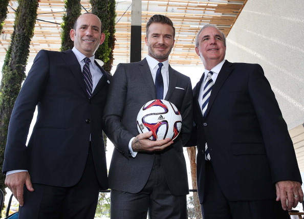Commissioner Don Garber, David Beckham and Mayor Carlos Gimenez attends a press conference to announce their plans to launch a new Major League Soccer franchise at PAMM Art Museum on February 5, 2014 in Miami, Florida. (Photo by Aaron Davidson/Getty Images)