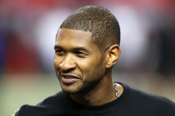 ATLANTA, GA - JANUARY 20:  Singer Usher stands on the field during warm ups prior to the Atlanta Falcons hosting the San Francisco 49ers in the NFC Championship game at the Georgia Dome on January 20, 2013 in Atlanta, Georgia.  (Photo by Streeter Lecka/Getty Images)