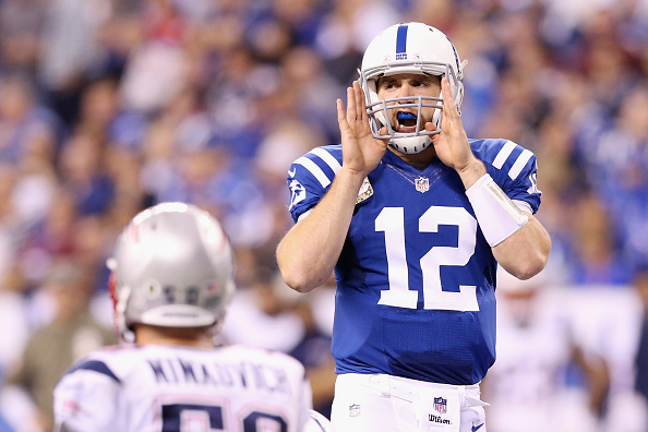 Quarterback  Andrew Luck #12 of the Indianapolis Colts calls a play against the New England Patriots during the fourth quarter of the game at Lucas Oil Stadium on November 16, 2014 in Indianapolis, Indiana. (Photo by Andy Lyons/Getty Images)
