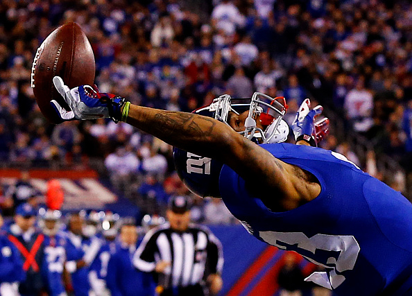 Odell Beckham #13 of the New York Giants scores a touchdown in the second quarter against the Dallas Cowboys at MetLife Stadium on November 23, 2014 in East Rutherford, New Jersey.(Photo by Al Bello/Getty Images)