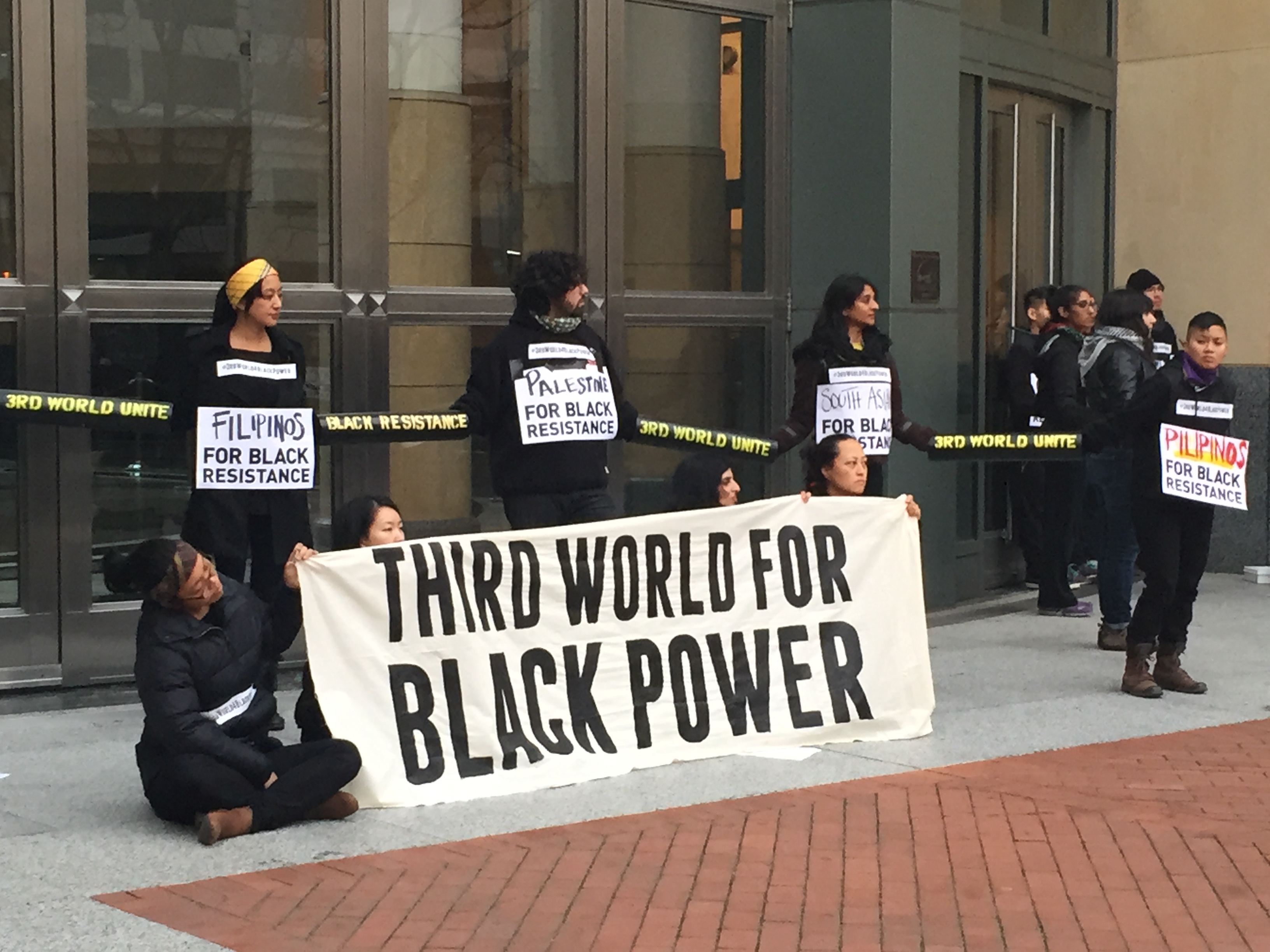 Protesters blocking the entrance to Oakland's federal building. (photo credit: Margie Shafer)