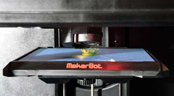 A MakerBot Replicator desktop 3D printer.  (Photo by Ethan Miller/Getty Images)