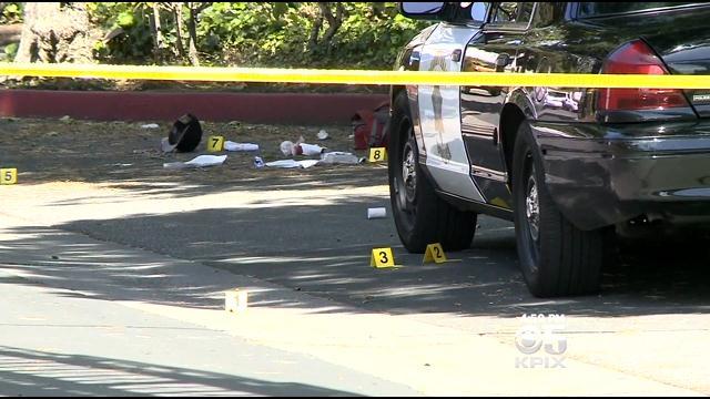 Evidence markers at the scene of a fatal officer-involved shooting near Tasman Drive and Lawrence Expressway in Sunnyvale on April 8, 2015. (CBS)