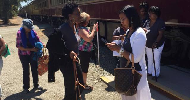 Women stand outside the Napa Valley Wine Train after their group was removed from the train, August 22, 2015. (Lisa Renee Johnson/Facebook)