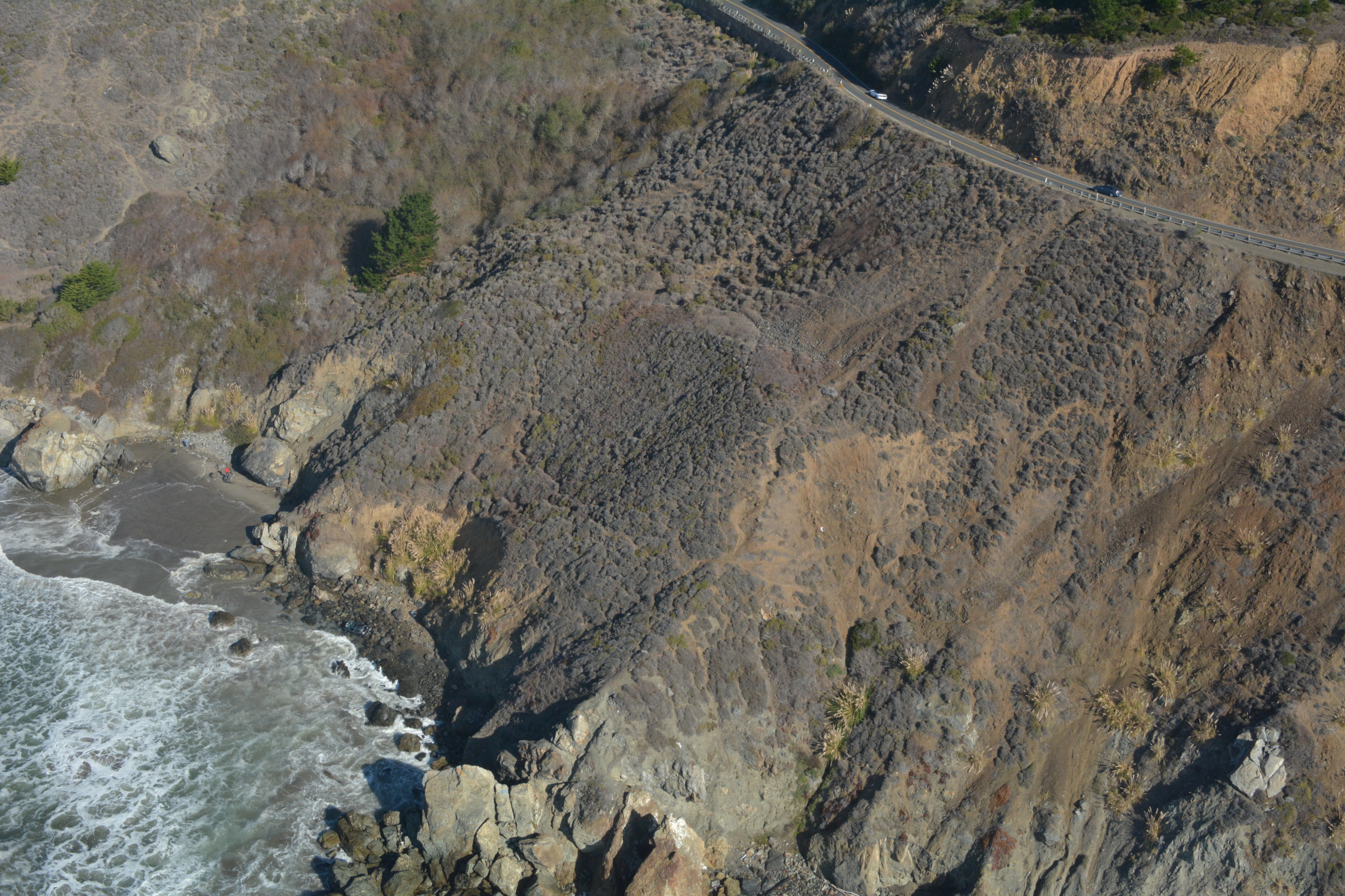 Steep cliff near Stinson Beach where a driver and passenger plunged, landing on the ocean and rocks below. (CHP)