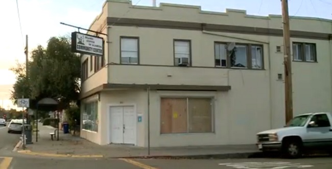 Boarded up shattered window of the Islamic Center of Alameda. (CBS)