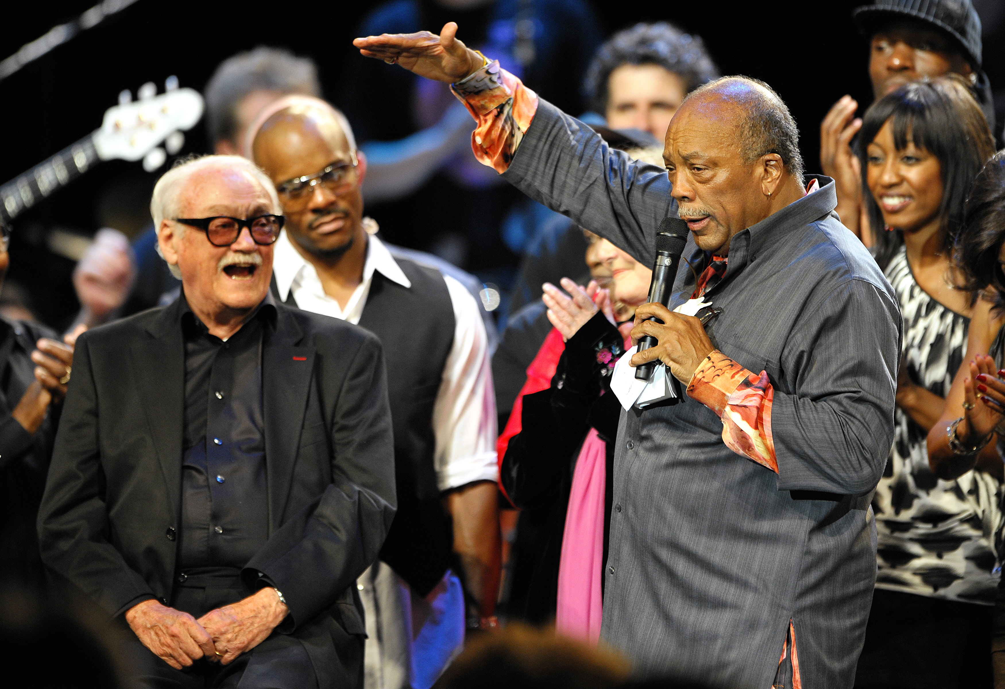 US music producer Quincy Jones (R) gestures with jazz harmonica player Toots Thielemans at the 42nd Montreux Jazz Festival. (FABRICE COFFRINI/AFP/Getty Images)
