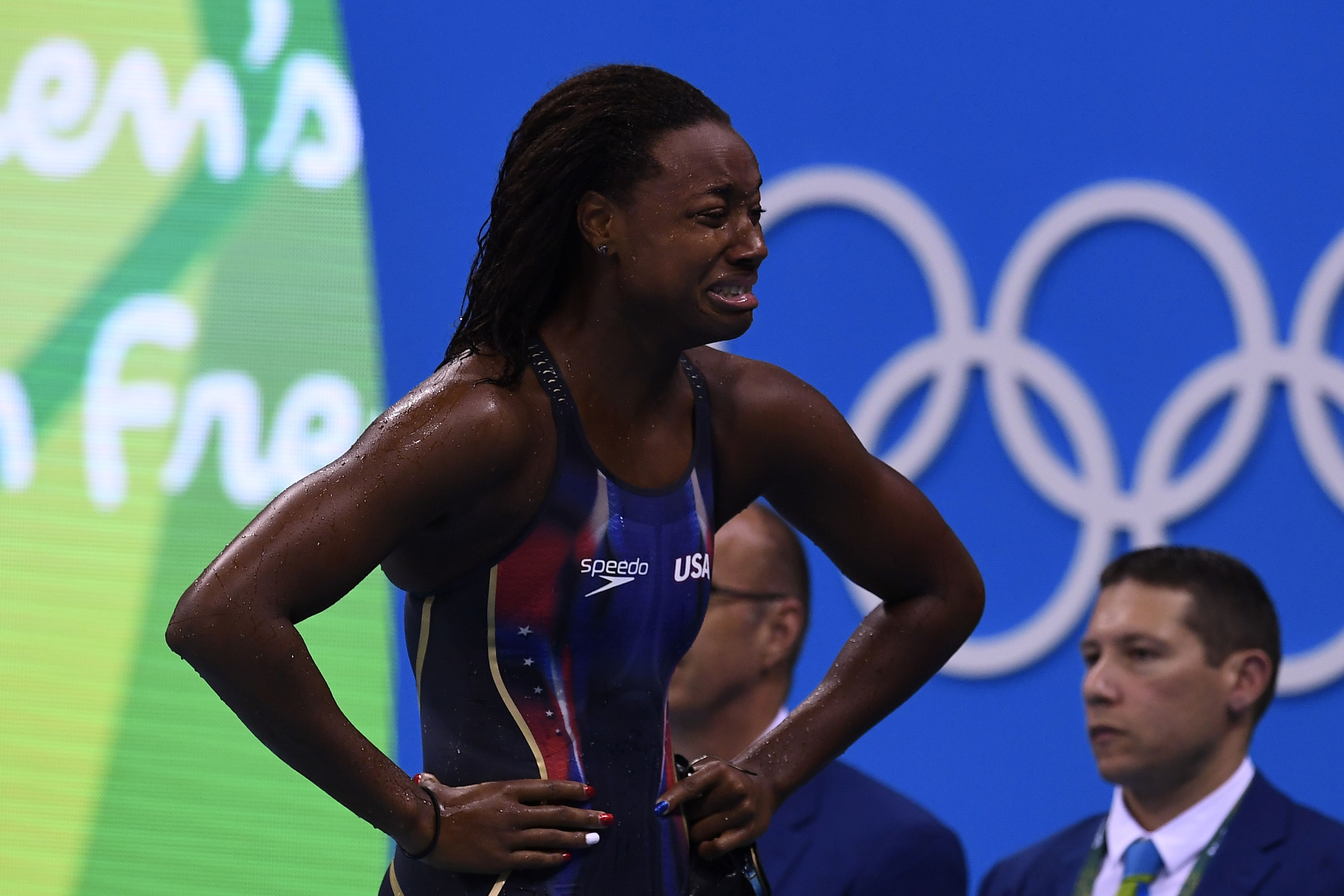 USA's Simone Manuel cries after she won the Women's 100m Freestyle Final during the swimming event at the Rio 2016 Olympic Games at the Olympic Aquatics Stadium in Rio de Janeiro. (GABRIEL BOUYS/AFP/Getty Images)