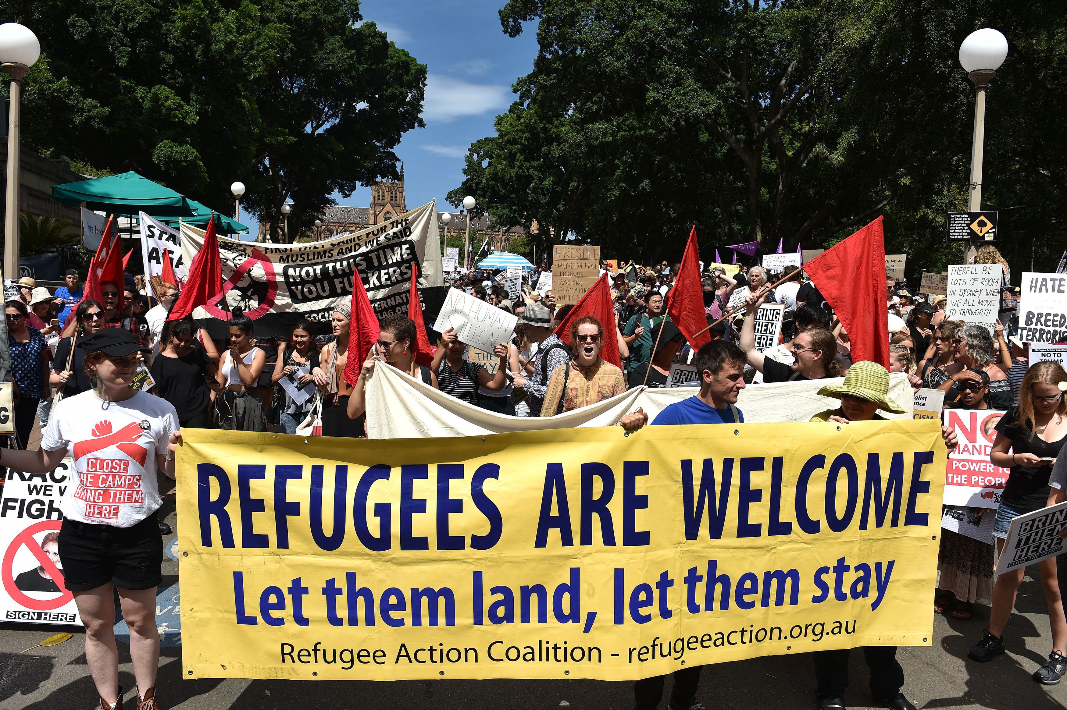 Protestors march on the streets of Sydney's central business district against US President Donald Trump's travel ban policy on February 4, 2017. (SAEED KHAN/AFP/Getty Images)