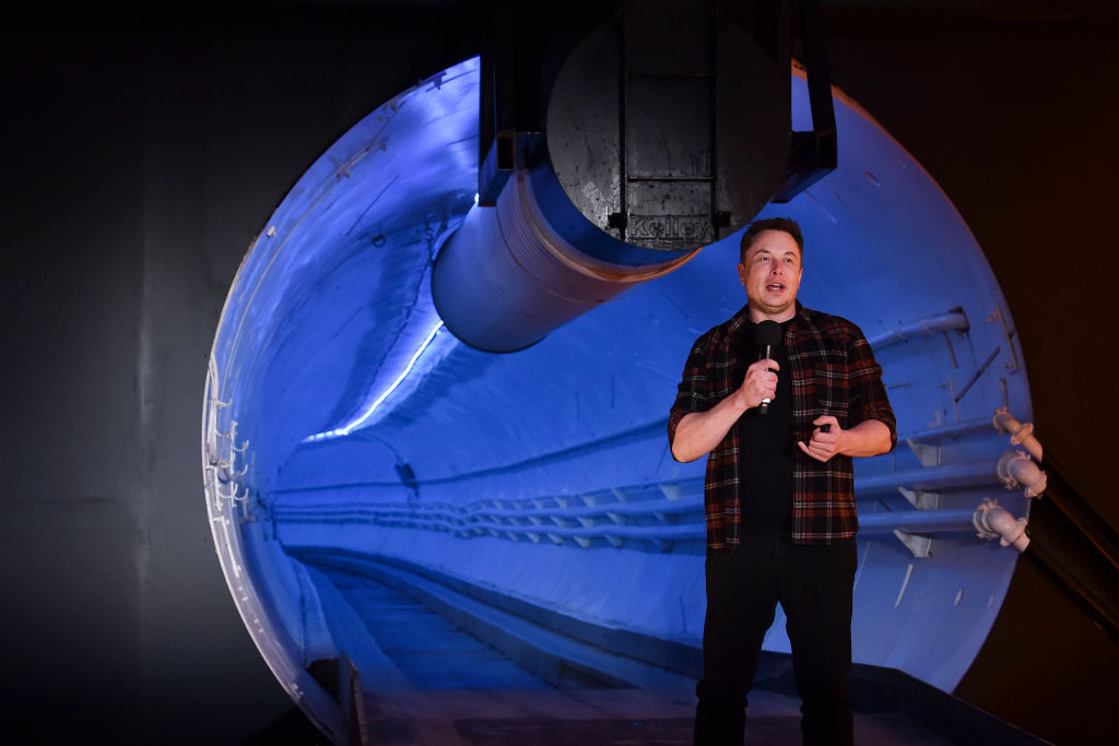 Elon Musk, co-founder and Chief Executive Officer of Tesla Inc., speaks at an unveiling event for The Boring Company Hawthorne test tunnel December 18, 2018 in Hawthorne, California. (Robyn Beck-Pool/Getty Images)