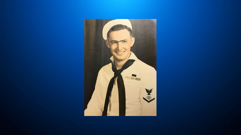 This photo provided by retired U.S. Navy Cmdr. Don Long shows Long in his Navy uniform in 1943. Long wasn't at Pearl Harbor when Japanese warplanes bombed Hawaii on December 7, 1941 - he was on the opposite side of Oahu aboard an anchored seaplane in Kaneohe Bay. But the Japanese strike reached his installation soon after Pearl Harbor, and the young sailor watched from afar as explosions and gunfire consumed him and his comrades. Now, 77 years later, Long will remember that day from even farther away - across the Pacific at his home in Northern California. (Don Long via AP)