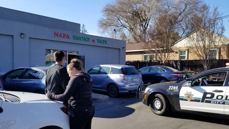 Authorities on the scene of the Napa Vape and Smoke Shop in Napa as they investigate allegations of selling cannabis to minors. (Napa Police Department / Facebook)