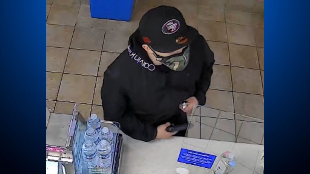 Surveillance photo of man suspected in an armed robbery at a Baskin Robbins on Middlefield Road in Palo Alto on March 22, 2021. (Palo Alto Police Department)
