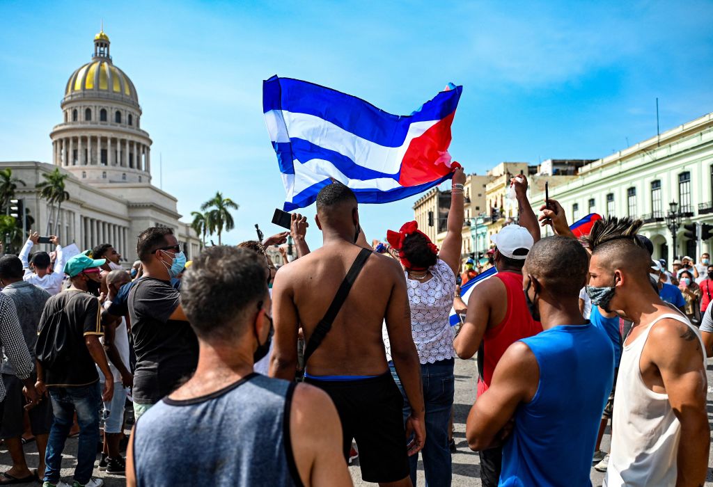 Cubans are seen outside Havana's Capitol during a demonstration against the government of Cuban President Miguel Diaz-Canel in Havana, on July 11, 2021. - (YAMIL LAGE/AFP via Getty Images)