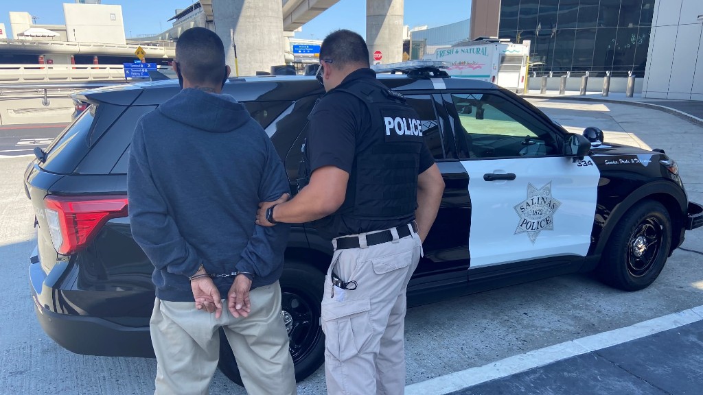 Juan Gabriel Nunez, suspect in the 2002 murder of Loretta Paluszynski, being taken into custody after being extradited to the United States on September 8, 2021. (Salinas Police Department)