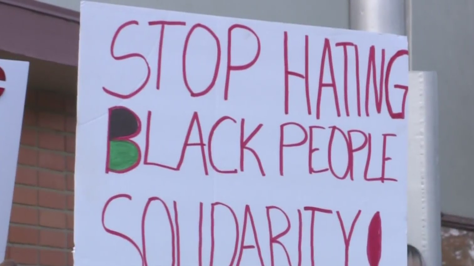 Community Rallies In Support Of Vice Principal Targeted By Own Students With Racist Graffiti