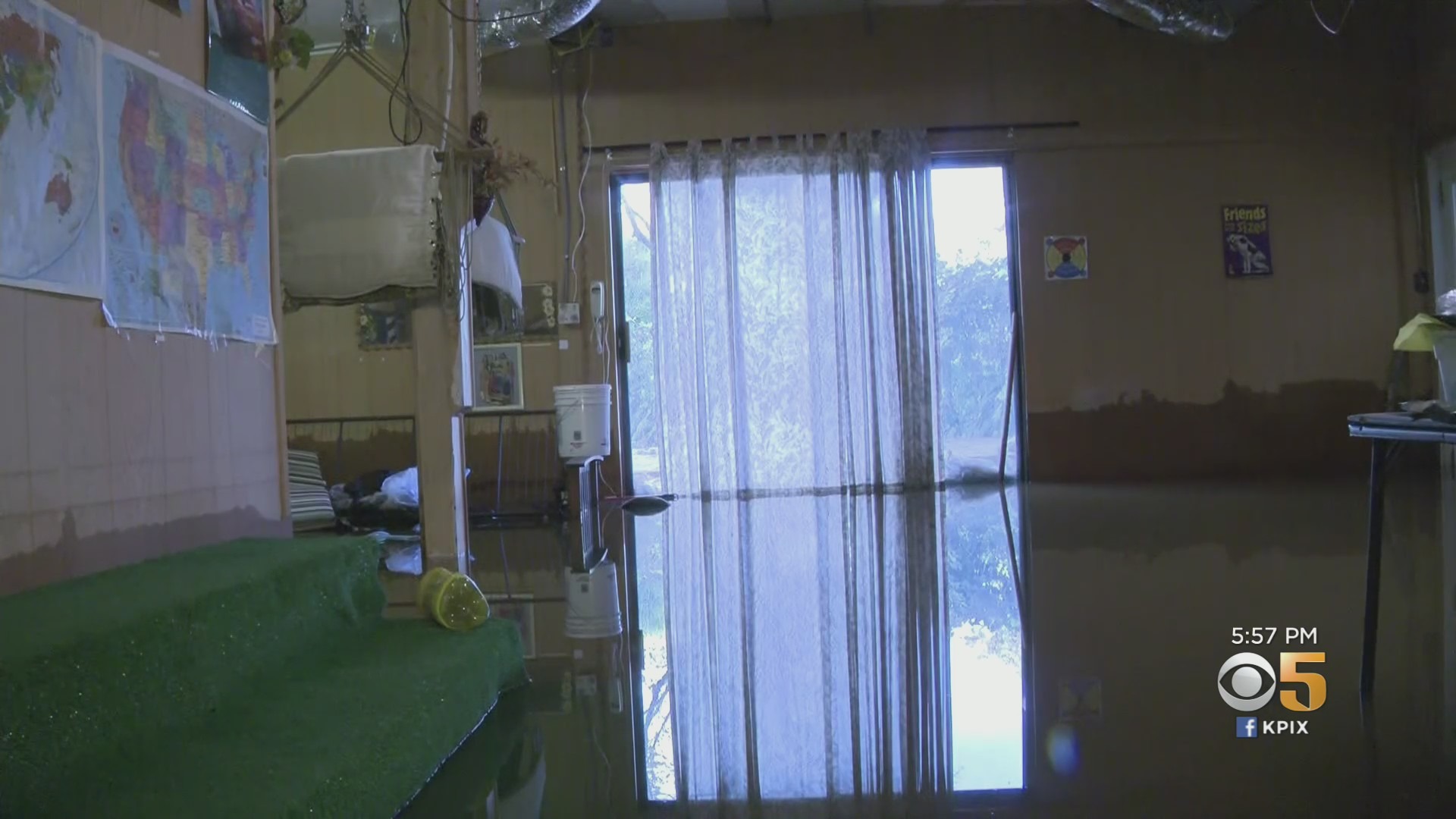 Flooding in the basement of Theresa Mendoza's home. The Oakland resident has blamed the repeated flooding on Caltrans not clearing debris in a culvert behind her home. (CBS)